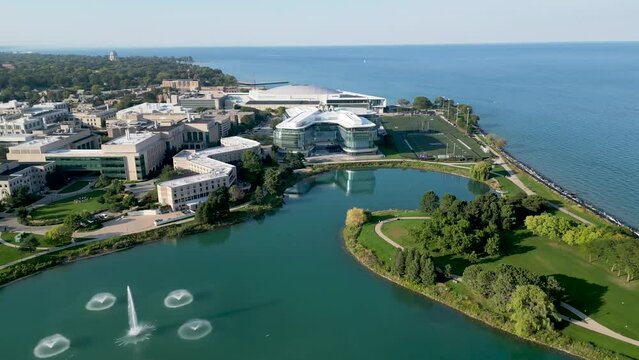 High resolution beautiful panoramic drone aerial 4K video of the famous Northwestern University and Kellogg School of Management Campus in Evanston IL during a beautiful summer day