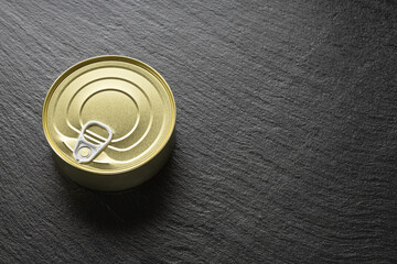 canned beef meat on the black background close up space for text