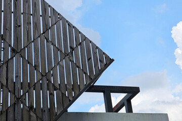 Wooden Partition on the Building Roof with Blue Sky.