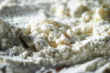 Making homemade noodles by mixing flour and eggs