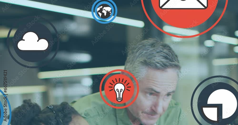 Poster animation of multiple icons over diverse coworkers discussing reports on desk in office