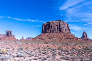 travel usa and north america, Monument Valley, in the centre Merrick Butte, left and right of it West Mitten Butte and East Mitten Butte