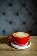 cup of cappuccino in red cup
