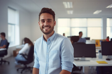 Fototapeta premium Man Standing in Blue Shirt in Office