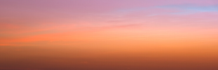 Panoramic views of the skyline and mountains. The sun rises in the morning sky with colorful clouds. and beautiful cloud patterns In the soft light of the morning