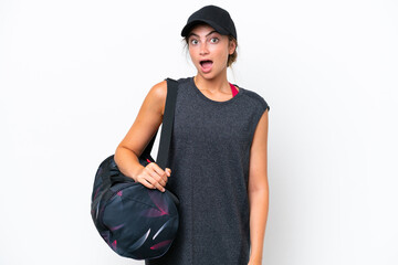 Young sport woman with sport bag isolated on white background with surprise facial expression