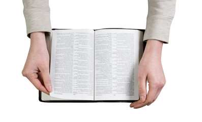 woman hands on bible. she is reading and praying over bible