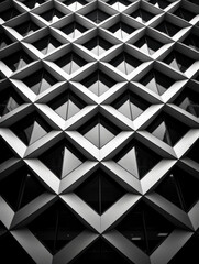 architecture minimaliste et moderne d'une façade d'un immeuble aux fenêtres en forme de losanges