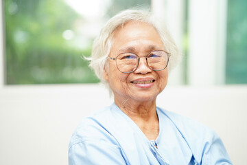 Fototapeta na wymiar Asian senior woman wearing eyeglasses or vision glasses at home care service.
