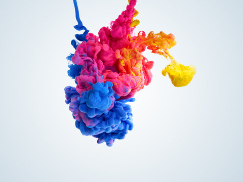 Splash of yellow, pink and blue blended paints