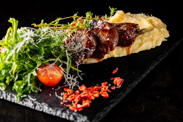 beef Cheeks In Demiglas Sauce with mashed potatoes and salad