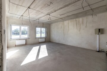 Empty concrete commercial space without finishing with partitions