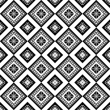 Geometric ethnic black and white flower pattern for background,fabric,wrapping,clothing,wallpaper,Batik,carpet,embroidery style.