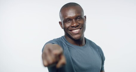 Man, smile and pointing in portrait for exercise, personal trainer and promotion for health. Black male model, join us and invite in mockup, motivation and encouragement in studio by white background