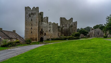 Bolton castle surrounded by lush green grass, Bolton Castle, North Yorkshire, UK