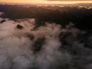 Fototapeta premium Aerial landscape in Phong Nam valley, an extreme scenery landscape at Cao bang province, Vietnam with river, nature, green rice fields