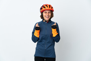 Young English cyclist woman isolated on white background making money gesture