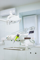 dental office. dentist's tool. drill. armchair. color palette. nippers, scalpels. Dental equipment. Closeup photo of dental handpieces . Dental drills in dentists office