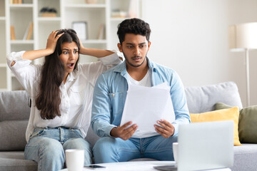 Young Indian couple reacts to shocking document at home