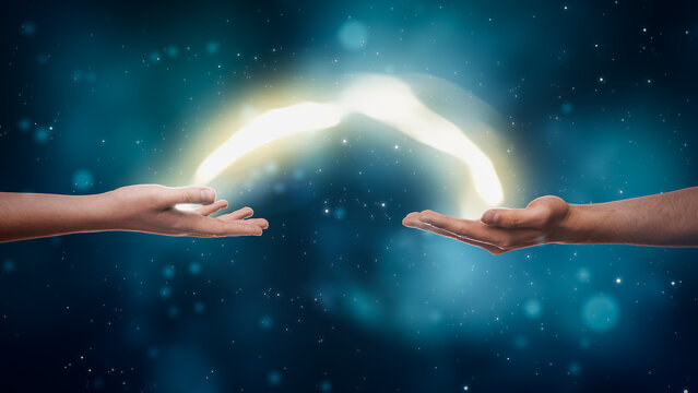 Visualization Of Two Hands Exchanging Bright Yellow Stream Of Magical Energy On Dreamy Dark Blue Background. Two People With Spiritual Connection Charging Each Other With Esoteric Power Concept