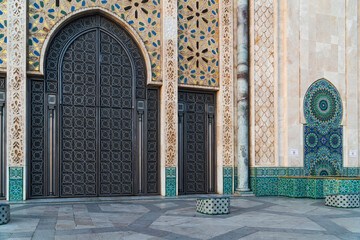 view of Hassan II mosque's big gate full of beautiful moroccan mosaic pattern, Detail of Hassan 2...