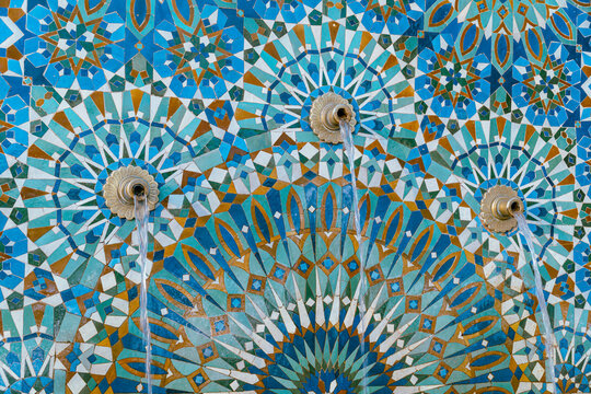 The Hassan II Mosque exterior water fountain decorated with a beautiful moroccan mosaic pattern in Casablanca, Morocco.