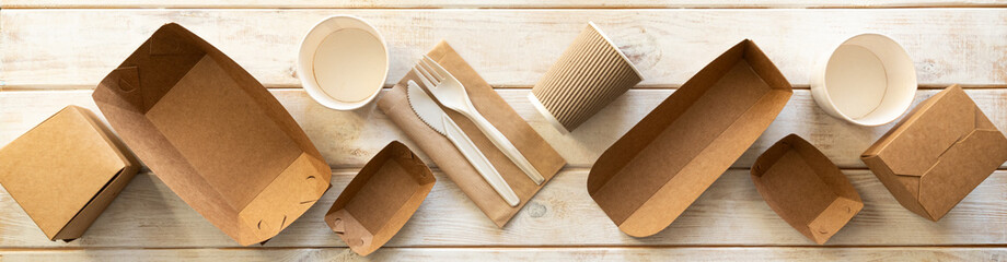Packaging concept - selection of paper craft packaging on white wood background - obrazy, fototapety, plakaty
