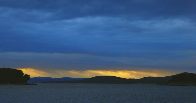 Heavy clouds and strong wind with waves in the evening on the Adriatic coast in Istra during sunset, Croatia