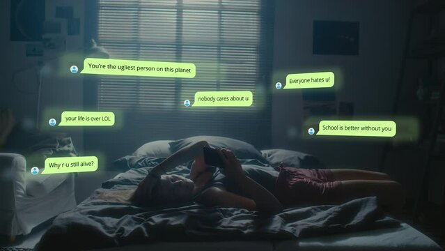 Stressed girl lying down on bed at night and receiving bullying messages on mobile phone. CG animated text popping up around