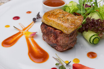 Foie gras on a white plate
