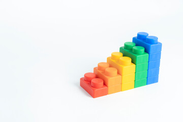 Many toy blocks in different colors on white background