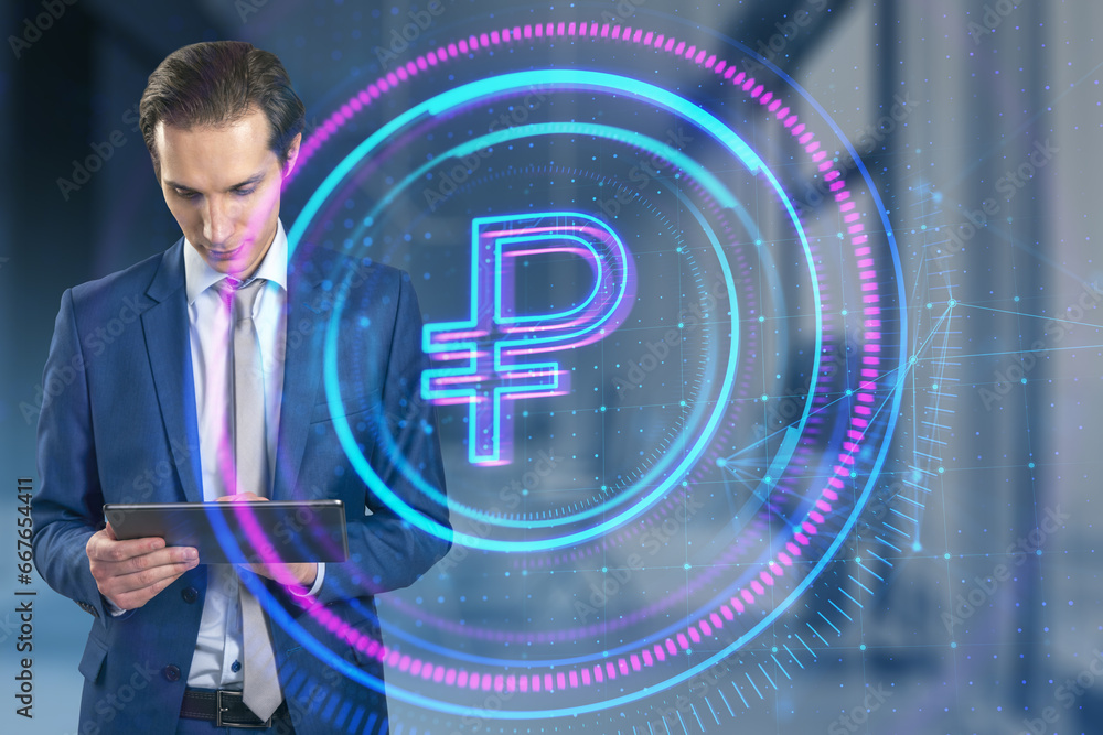 Poster attractive young businessman using tablet with glowing round polygonal button with ruble sign on blu