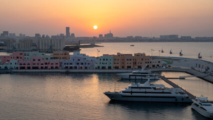 Fototapeta premium bird view of beautiful doha skyline, with many offices and residential towers.