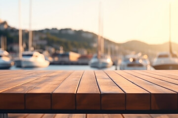 empty wooden table against the background of yachts in the bay