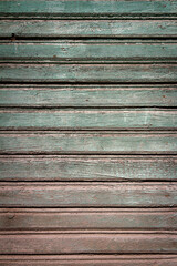 Fototapeta premium Pelling green paint on wood