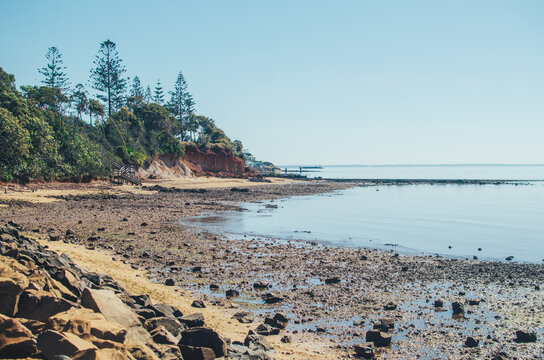 Rocky beach in Brisbane at midday