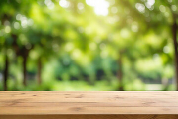 Empty wood table top and blurred view from green tree garden bokeh background. Product and food display