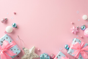 Celebrate the New Year in style with a pastel pink backdrop adorned with top-view of baubles, glittering star, luxurious presents, mistletoe berries, offering room for text or advertising