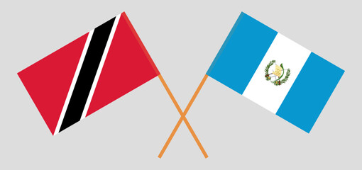 Crossed flags of Trinidad and Tobago and Guatemala. Official colors. Correct proportion