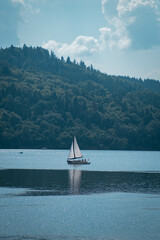 sailboat in the middle of the lake