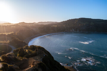Aerial View of the Sun Rising over Beach Bluffs in Pumillahue Chiloe Island Chile