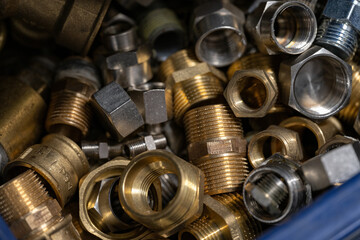 Various types of water fittings and couplings.