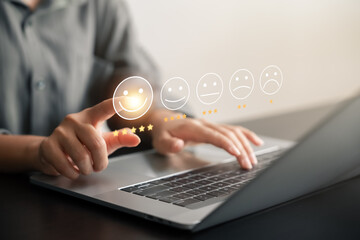 customer satisfaction survey concept businesswoman use laptop Touch the happy smiley icon. Satisfied. 5 stars. Service experience rating. online application Satisfaction Review best quality.