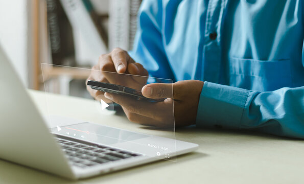 Man Using Smart Phone For Streaming Online On Virtual Screen, Watching Video On Internet, Live Concert, Show Or Tutorial, Content Online..