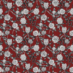 Vintage seamless pattern. Clover flowers, blooming field. Botanical elements are drawn in ink on a red background. Nature design for textile, wallpaper, packaging, paper.