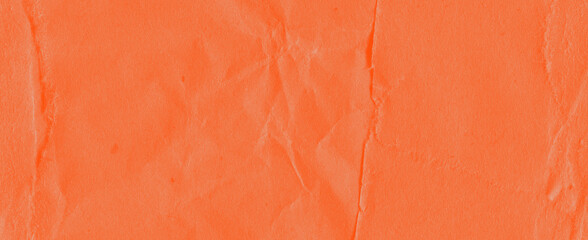 Recycled crumpled orange paper texture background. Royalty high-quality free stock photo image of Wrinkled and creased abstract backdrop, wallpaper with copy space, top view