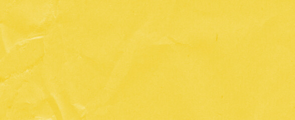 Recycled crumpled yellow paper texture background. Royalty high-quality free stock photo image of Wrinkled and creased abstract backdrop, wallpaper with copy space, top view