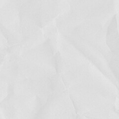 Recycled crumpled white paper texture background. Royalty high-quality free stock photo image of Wrinkled and creased abstract backdrop, wallpaper with copy space, top view