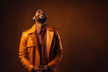 Obraz premium A Man in a Stylish Leather Jacket Expressing Genuine Laughter