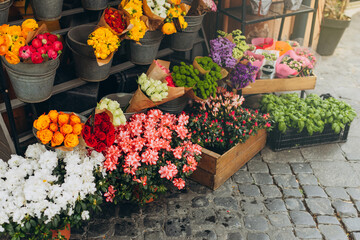 Street flowers store for retail sell. Small business concept. Flower market with various multicolored fresh bouquet, holiday banner, flower shop with colourful flowers for gift on holidays or date